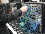 Modular Synthesizer Being Patched